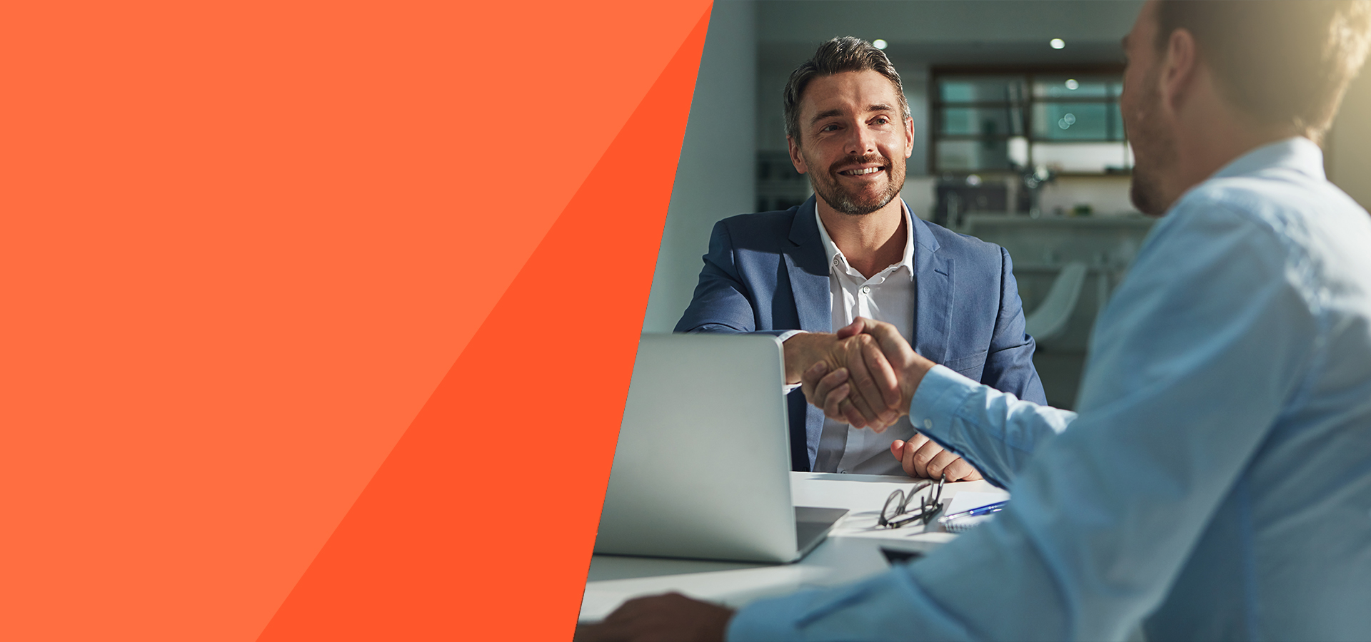 Business owner shaking hands with a financing advisor